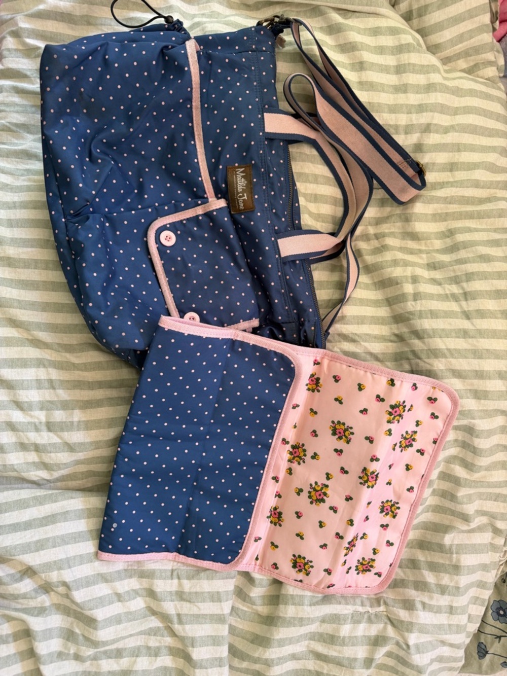 Navy Polka Dot Diaper Bag with Pink Trim and Floral Changing Pad